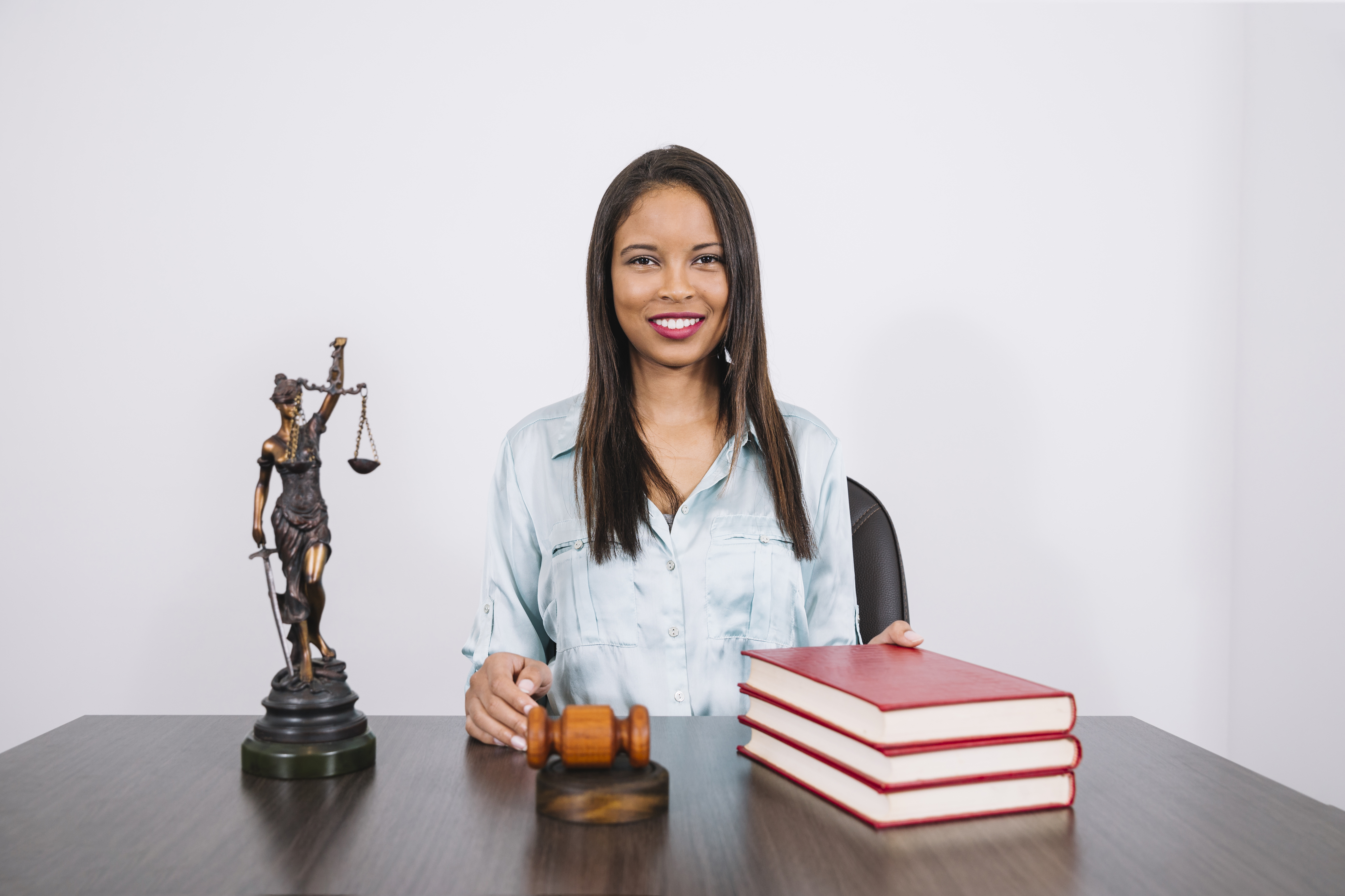 Lady with gavel and legal objects